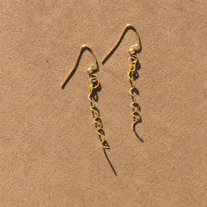 BloomTwist – Artistic Spiral Statement Earrings